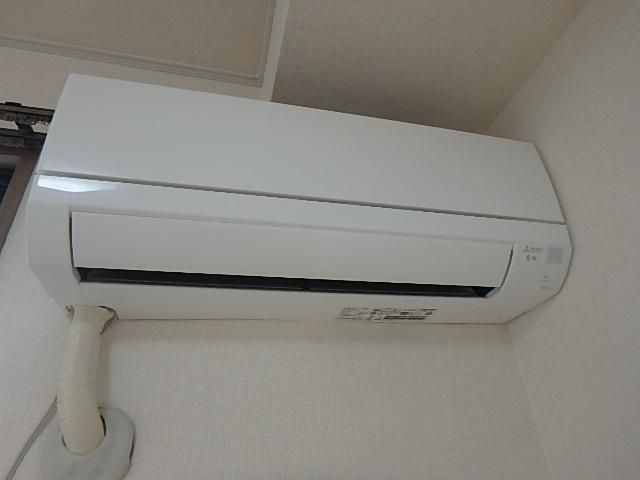 y̑ݔz@