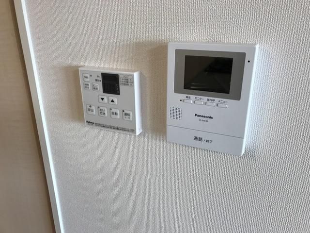 �y�Z�L�����e�B�z�@