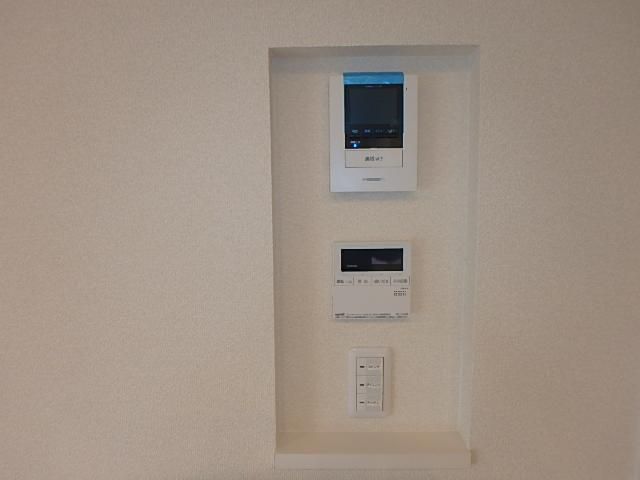 �y�Z�L�����e�B�z�@