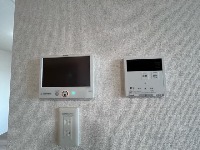 y̑ݔz@