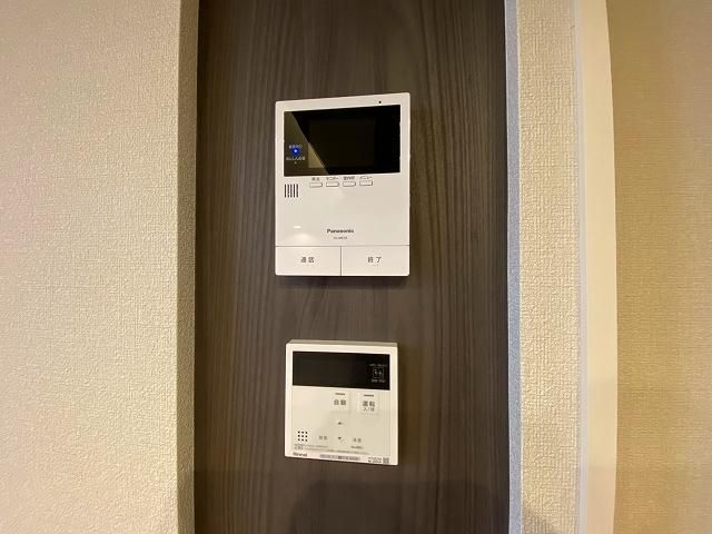 �y�Z�L�����e�B�z�@