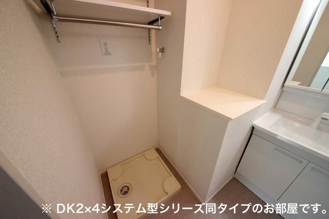 y̑ݔz@